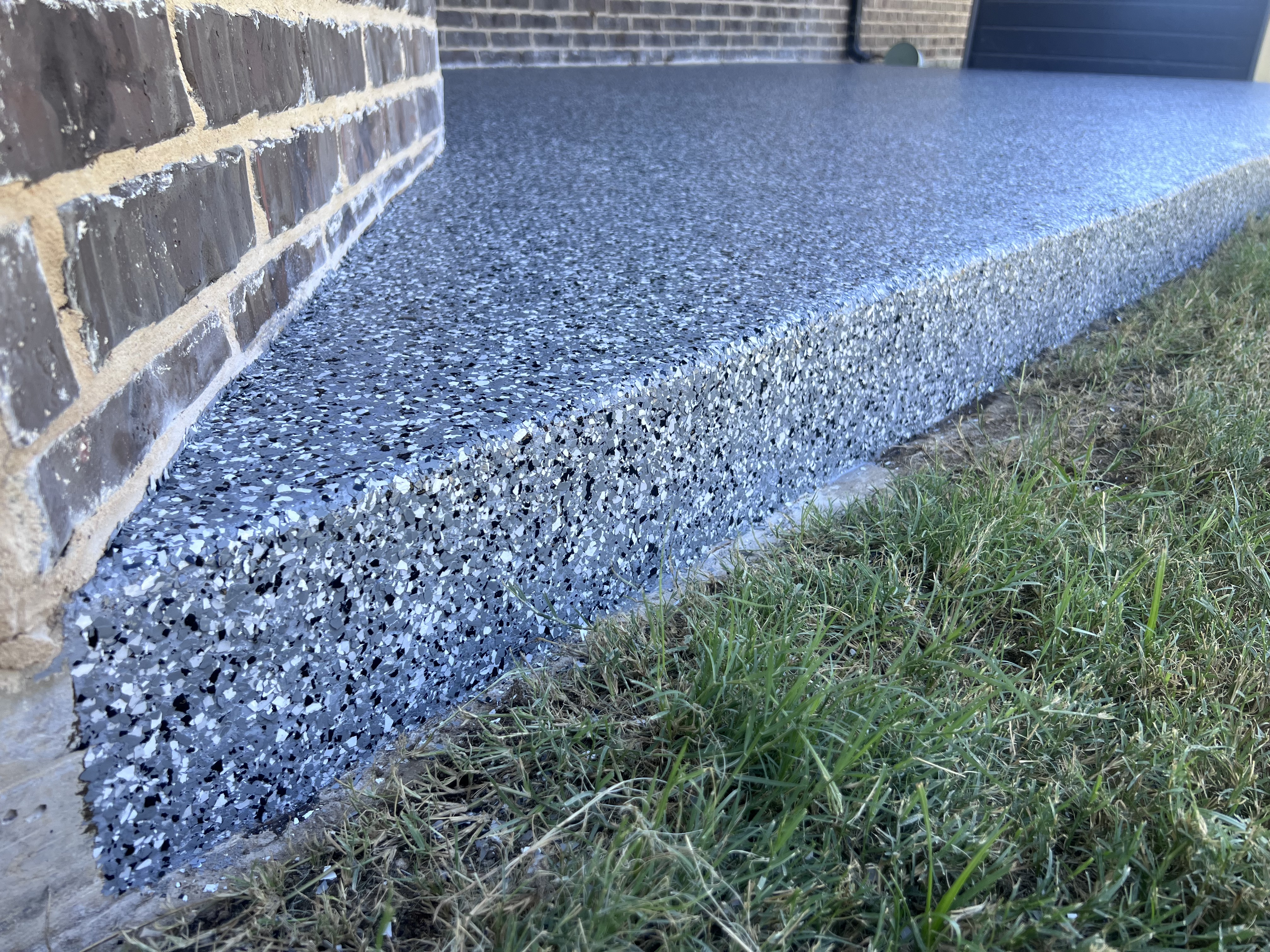 Speckled flake epoxy garage floor coating – DFW
