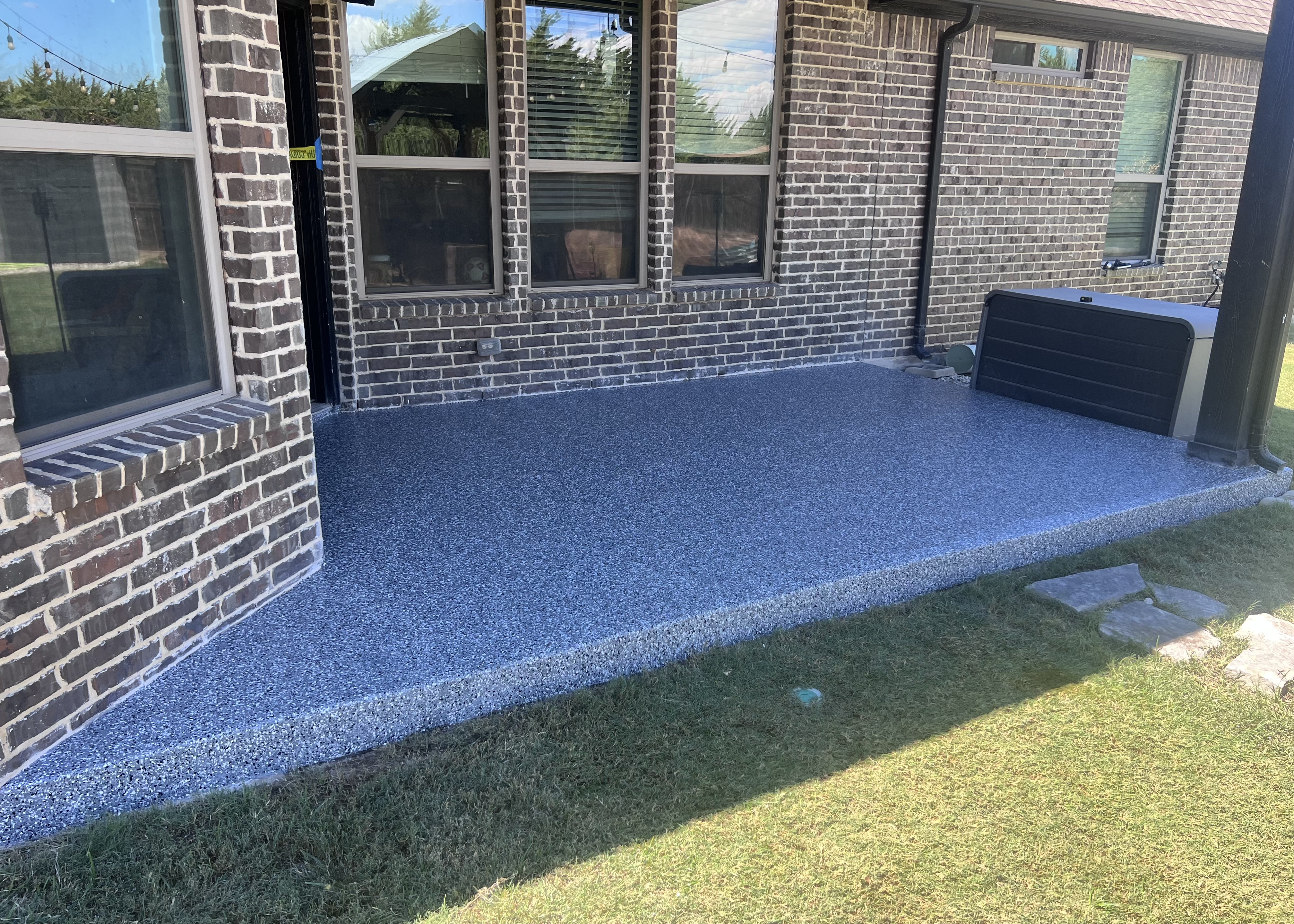 After: full-flake epoxy garage floor coating DFW